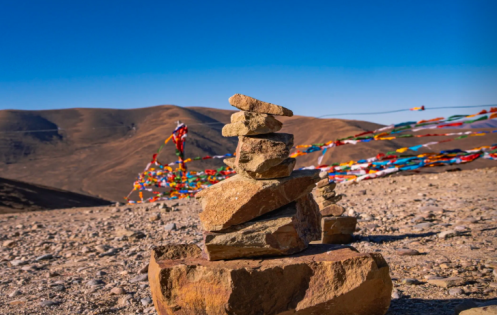 Whispers in Stone: Exploring Tibet’s Mani Stones and Cairn Culture