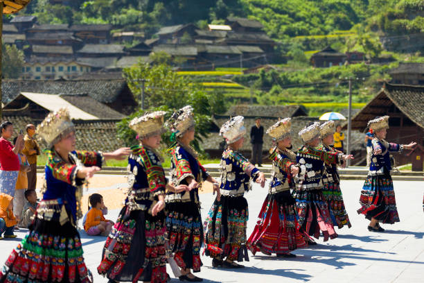 Miao women dancing in full traditional festival