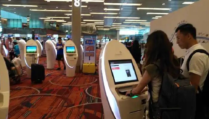 Passengers Checking in at Kuala Lumpur Airport