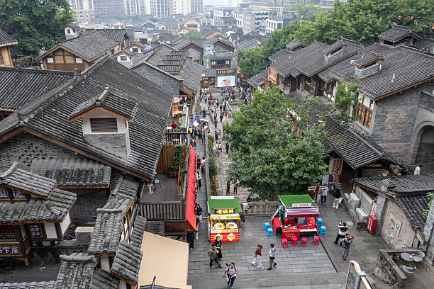 Chongqing, China- 3 Nov 2025: Tourists visit Shibati or Eighteen Stairs, in Chongqing, China.  Shibati is a centuries-old street in Chongqing with traditional houses and stone stairways