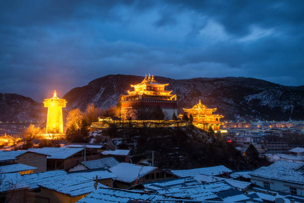 Beautiful Golden temple and biggest prayer wheel in Shangri la at twilight night scene