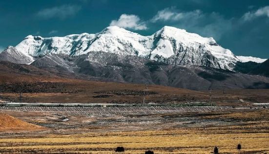 Distant View of Nyenchen Tanglha Mountains