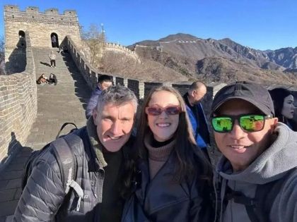 Foreign Tourists Experiencing the Great Wall